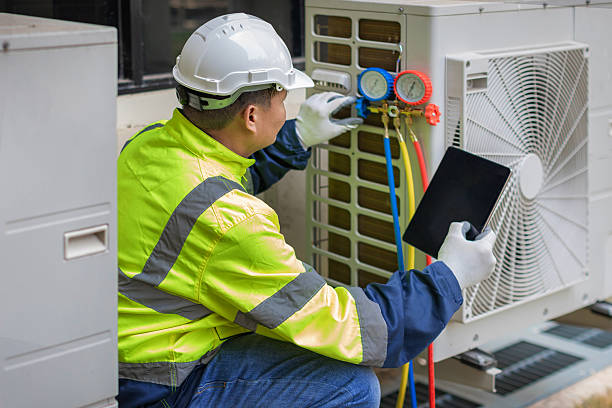 Professional Ac Installation technician working in Pioneer, OH